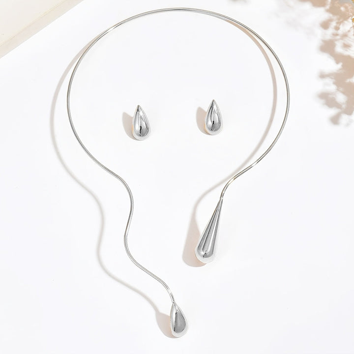 Taliah™ Elegant Necklace and Earring Set with Asymmetrical Drop Design