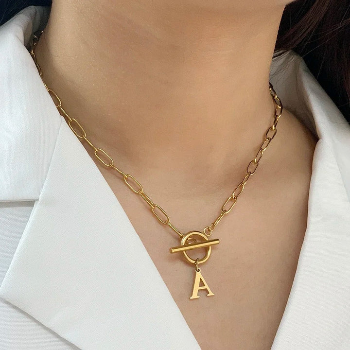 Ganelle™ Collar with Circular Lock Closure and Initial in Paperclip Shape